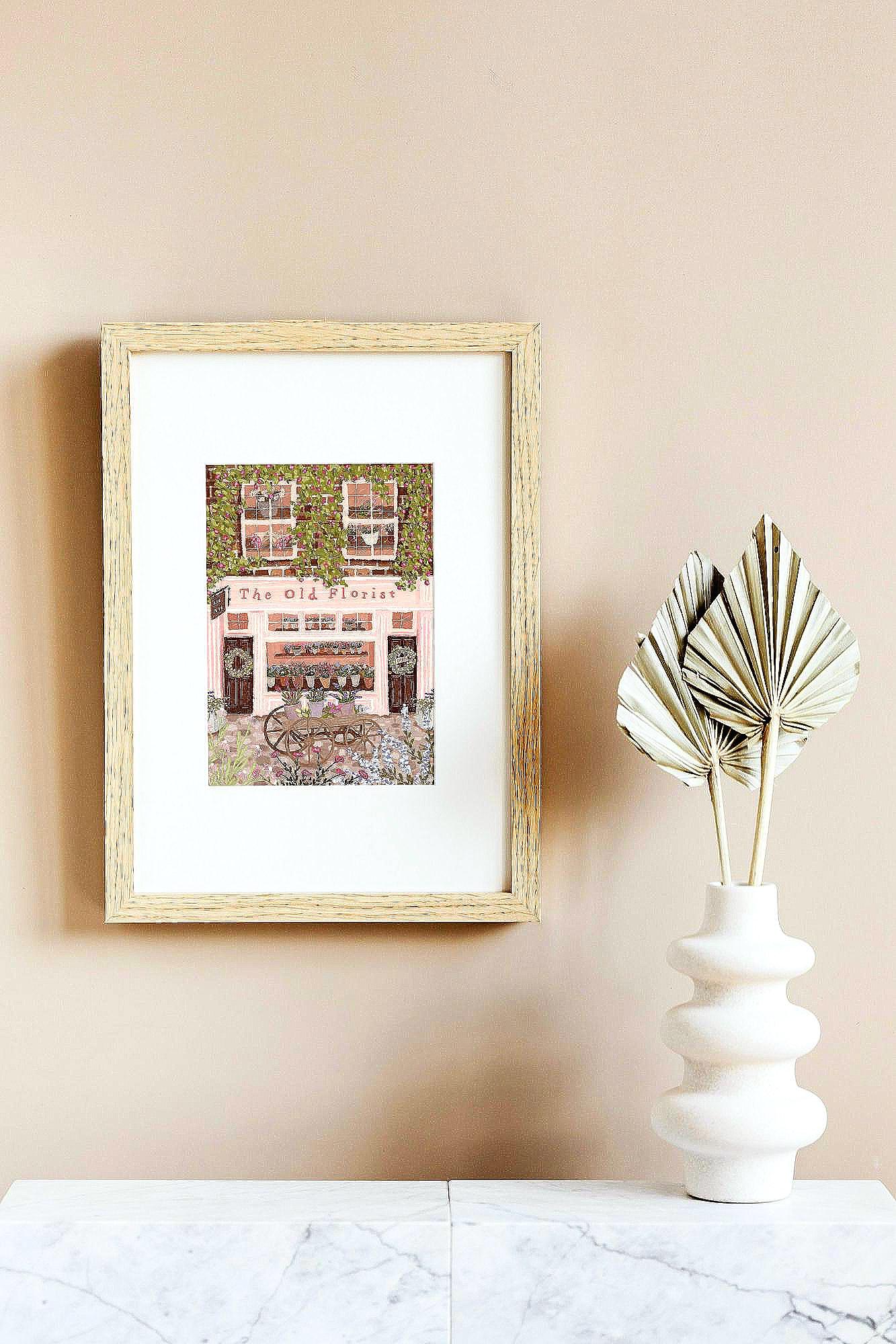 The Old Florist Print | Pink Flower Shopfront Wall Art | Cottagecore Floral Street Scene | Whimsical Pastel Shop Decor | Gift for Her